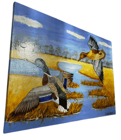 Original acrylic painting by South Louisiana artist Beverly LaFleur showing two mallard ducks flying over a marsh with water channels and golden grasses.