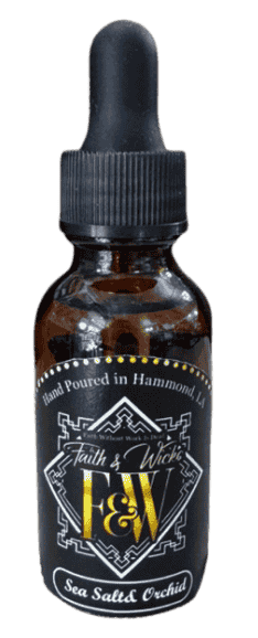 Faith & Wicks Sea Salt and Orchid fragrance oil in amber dropper bottle.
