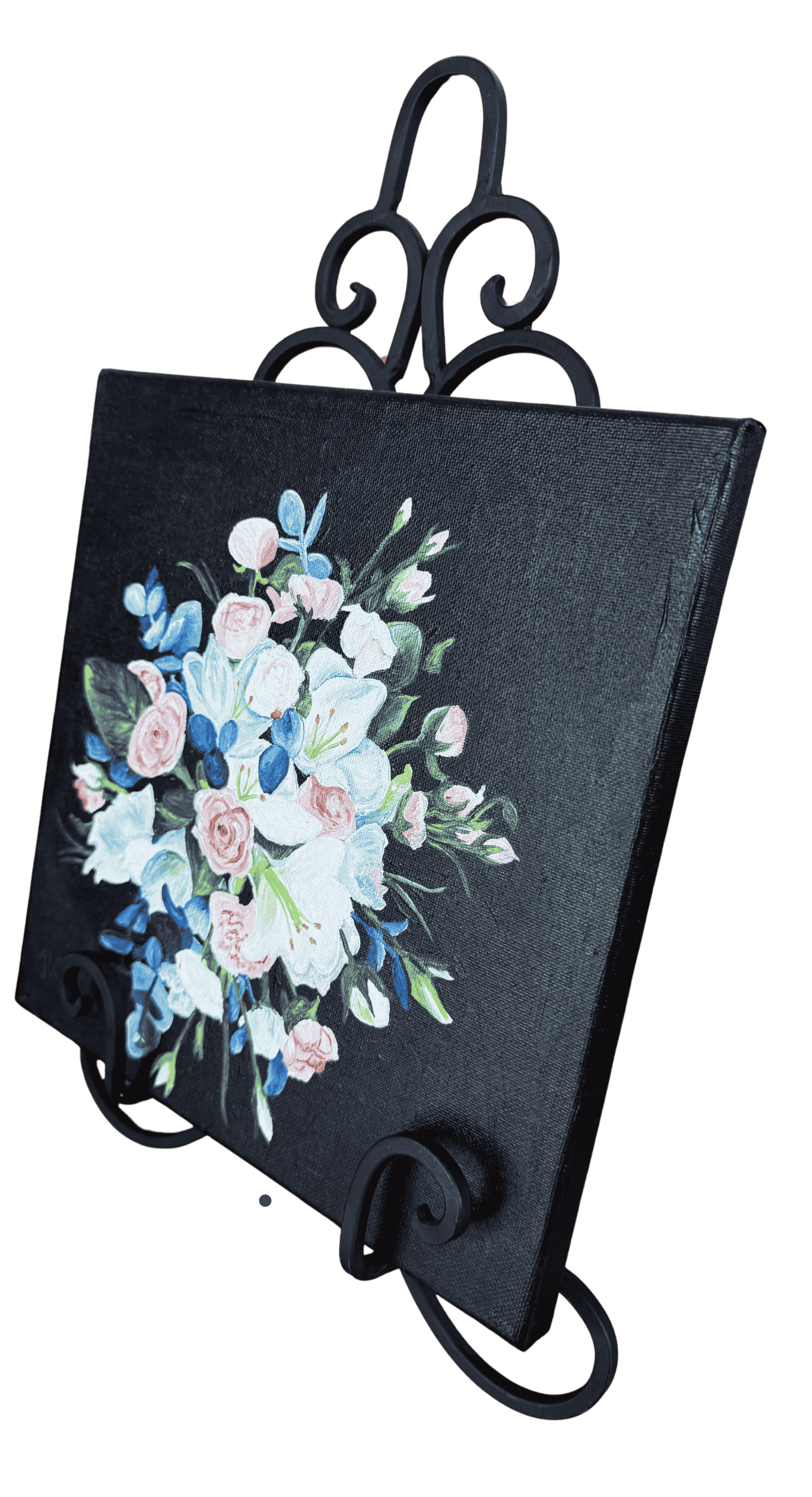 Side view of original floral painting featuring white flowers, soft pink roses, blue foliage, and black canvas background.