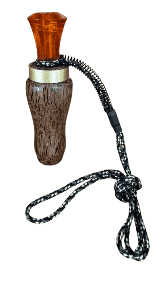 Red palm hand-turned double reed duck call by J. Baker Louisiana with amber acrylic mouthpiece and braided lanyard.