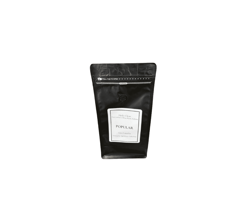 Heifer Clean Popular luxe powder laundry detergent with sparkling pear apple blossom chiffon musk scent.