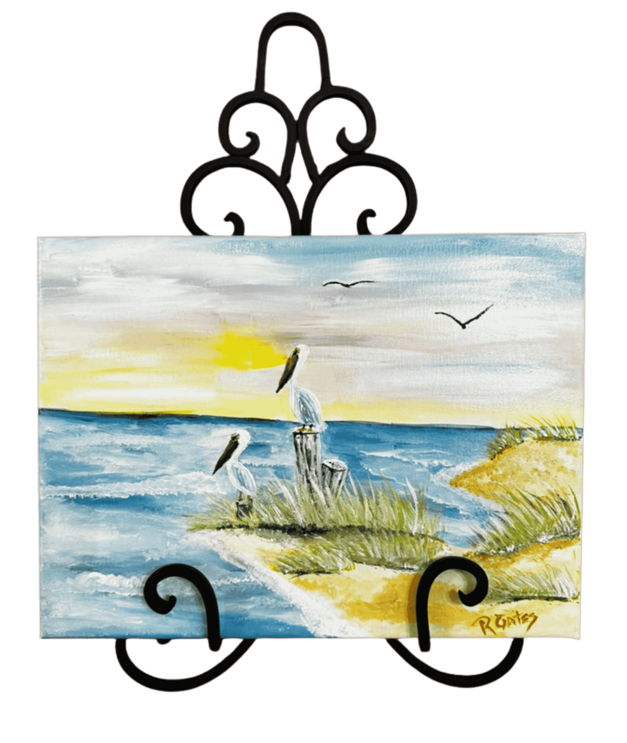 Original acrylic pelican painting by R. Gates featuring two pelicans perched along a coastal shoreline with marsh grass, ocean water, and a soft sunset sky.
