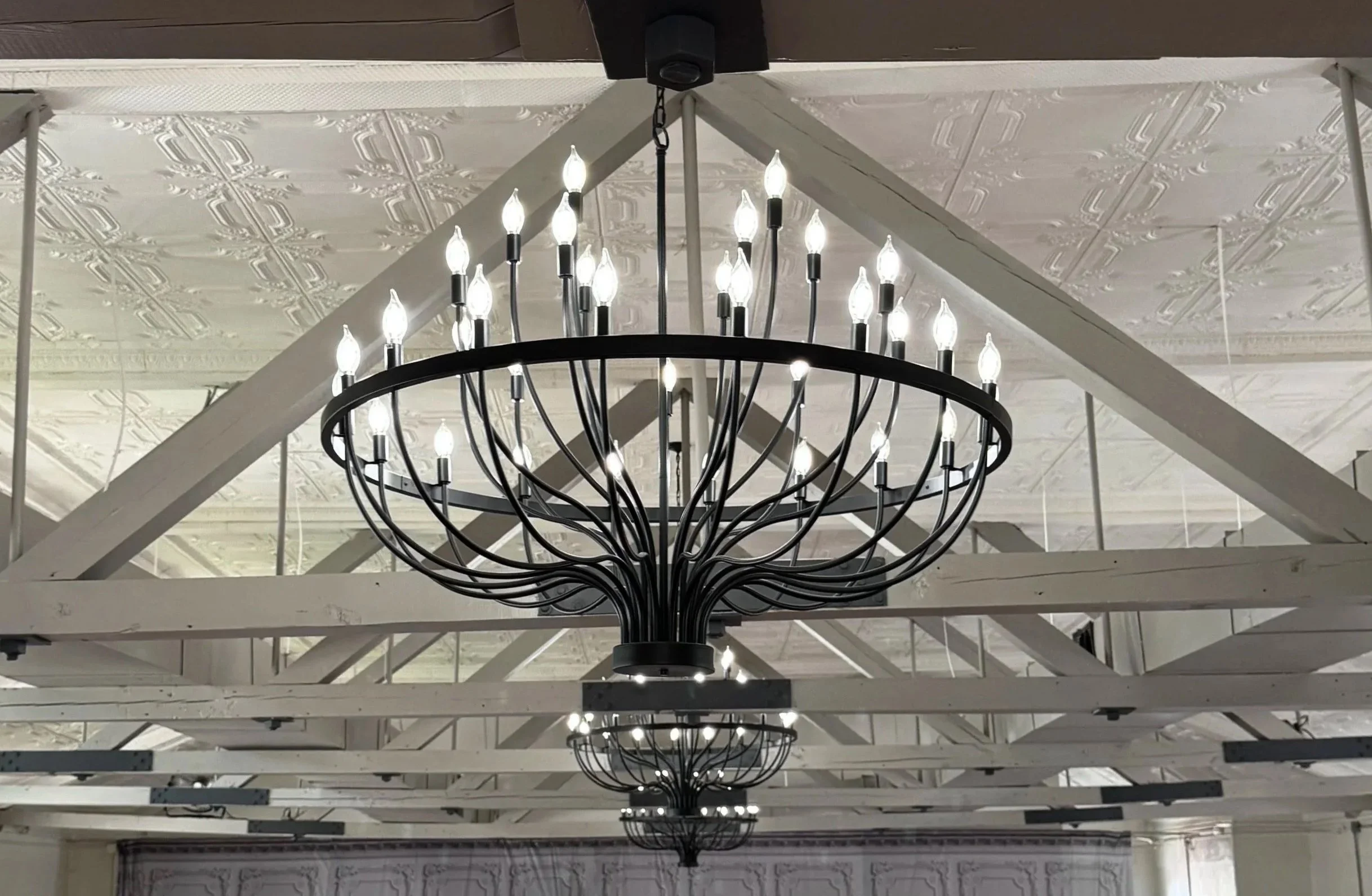 251 Park Venue Chandeliers Between Exposed Wooden Beams 