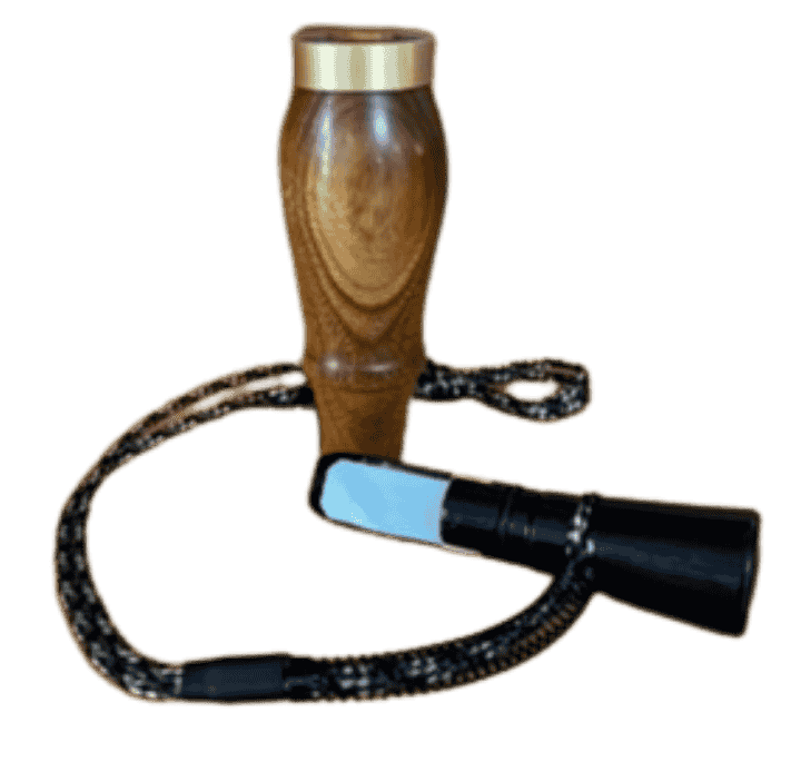 Canary wood hand-turned single reed duck call with brass band and braided lanyard handcrafted by Louisiana maker J. Baker.