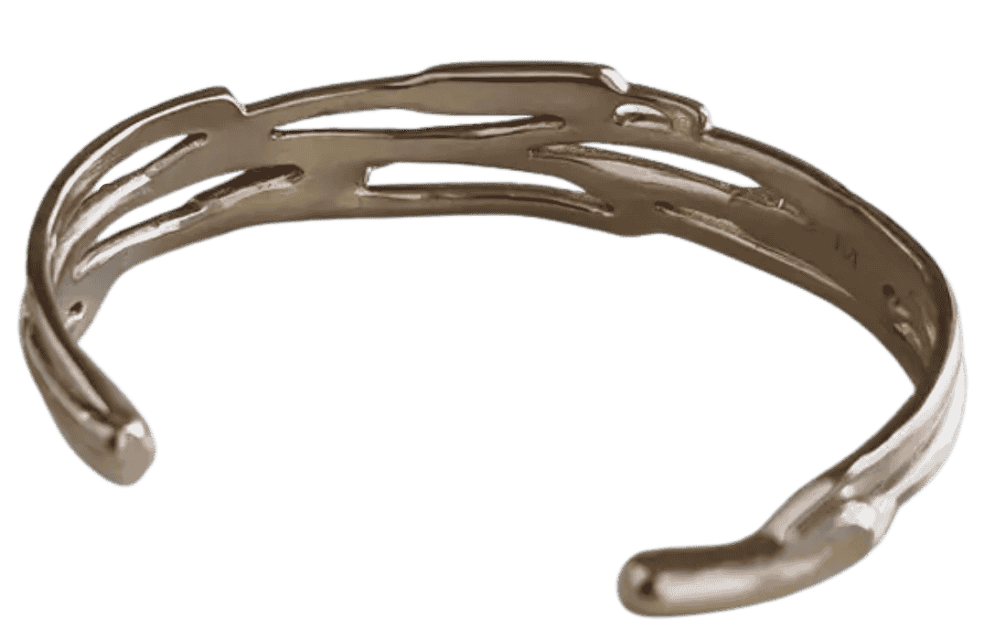 Solid cast metal cattail cuff bracelet handmade in South Louisiana studio.