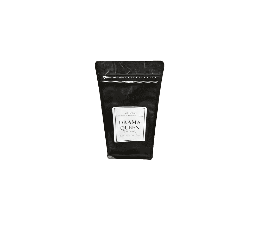 Heifer Clean Drama Queen luxe powder laundry detergent with clean ozone fruity green scent.
