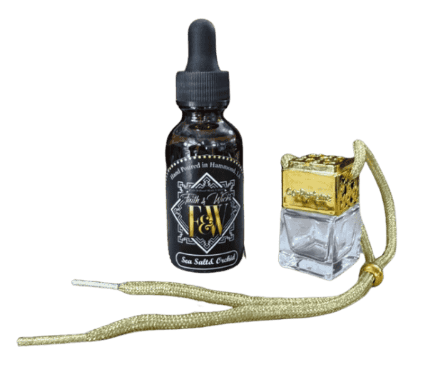 Faith & Wicks Sea Salt and Orchid fragrance oil in amber dropper bottle.