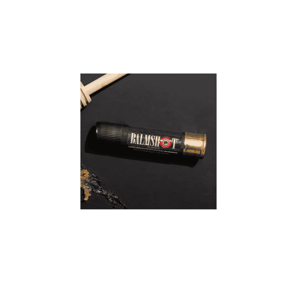balmshot classic beeswax lip balm in black packaging with shotgun shell tube and outdoor branding
