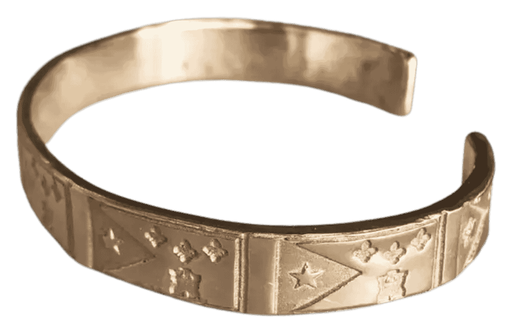 Handcrafted Acadiana flag cuff bracelet by MIMOSA showing detailed Louisiana Acadiana flag symbols.
