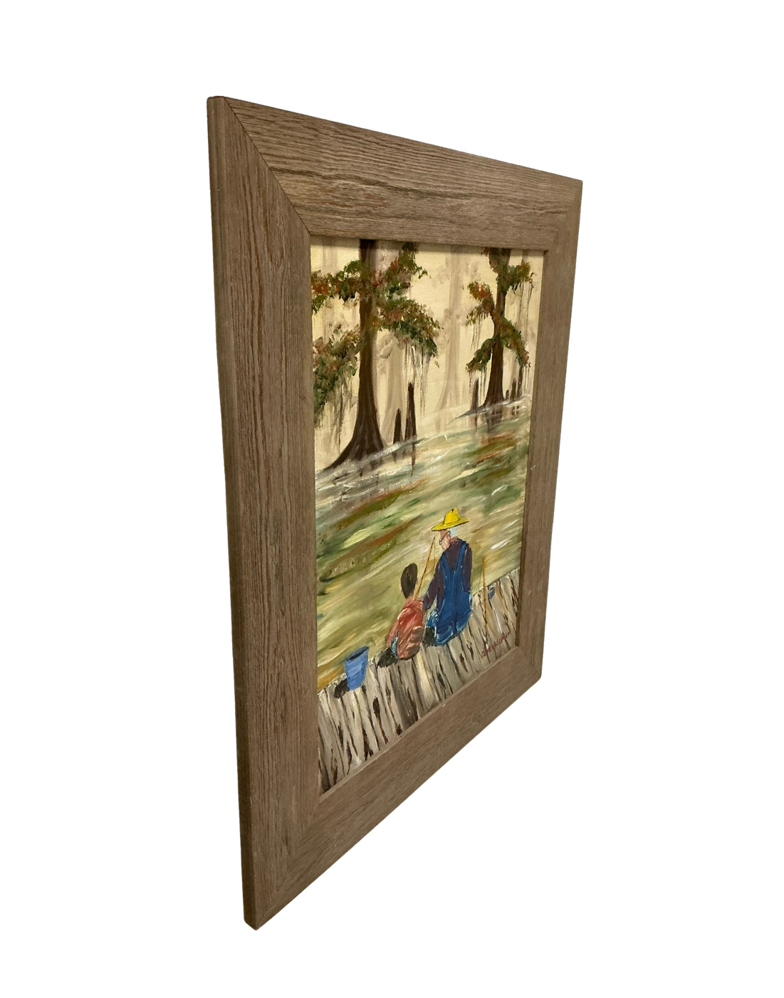 Angled view of Beverly LaFleur painting featuring a grandfather and grandson fishing beside calm swamp waters and cypress trees.