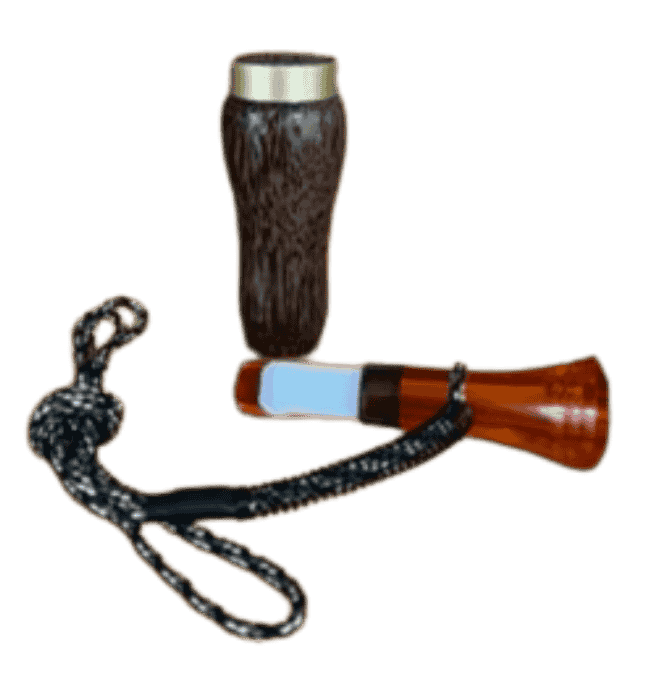 Disassembled red palm double reed duck call by J. Baker Louisiana showing acrylic insert and turned wood barrel components.