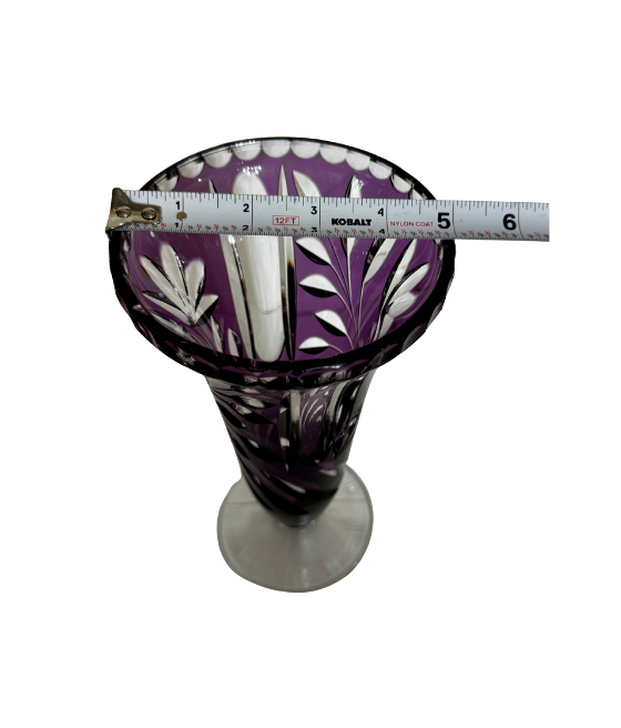 Top view of the amethyst crystal vase with a tape measure showing an opening approximately 5½ inches wide