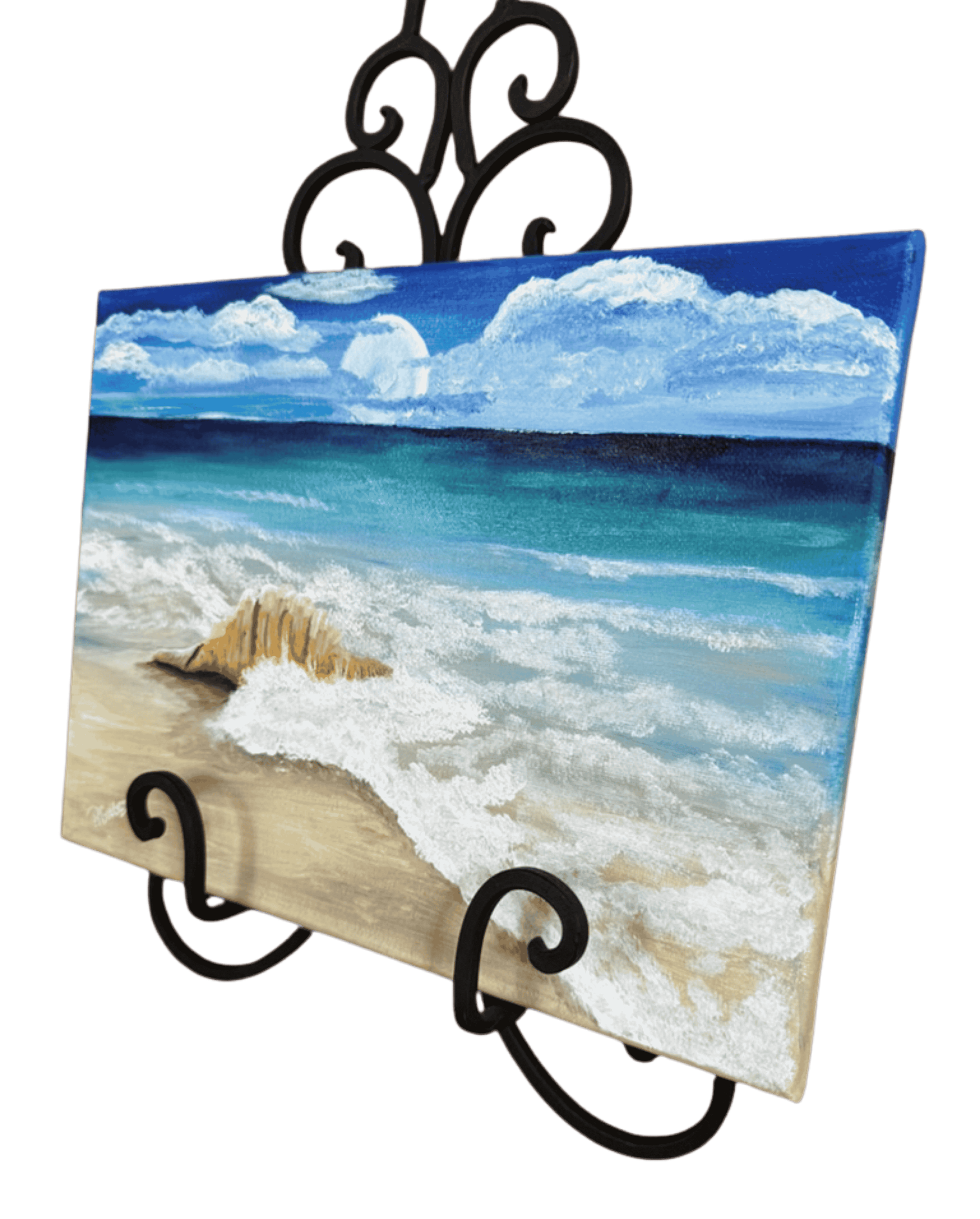 Side perspective of original acrylic seascape by R. Gates featuring a conch shell washed by surf beneath expansive blue coastal skies.