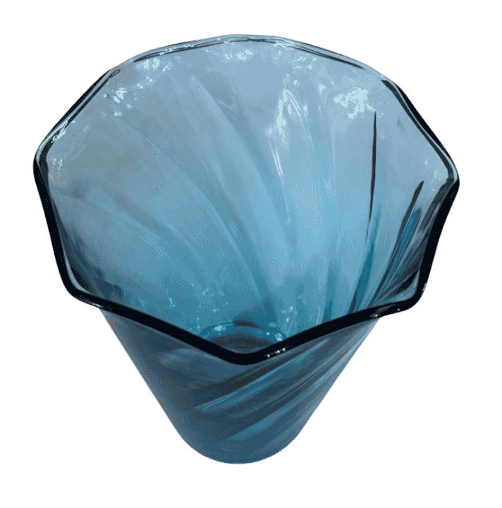 Side view of vintage blue twist glass vase showing spiral pattern and curved silhouette.
