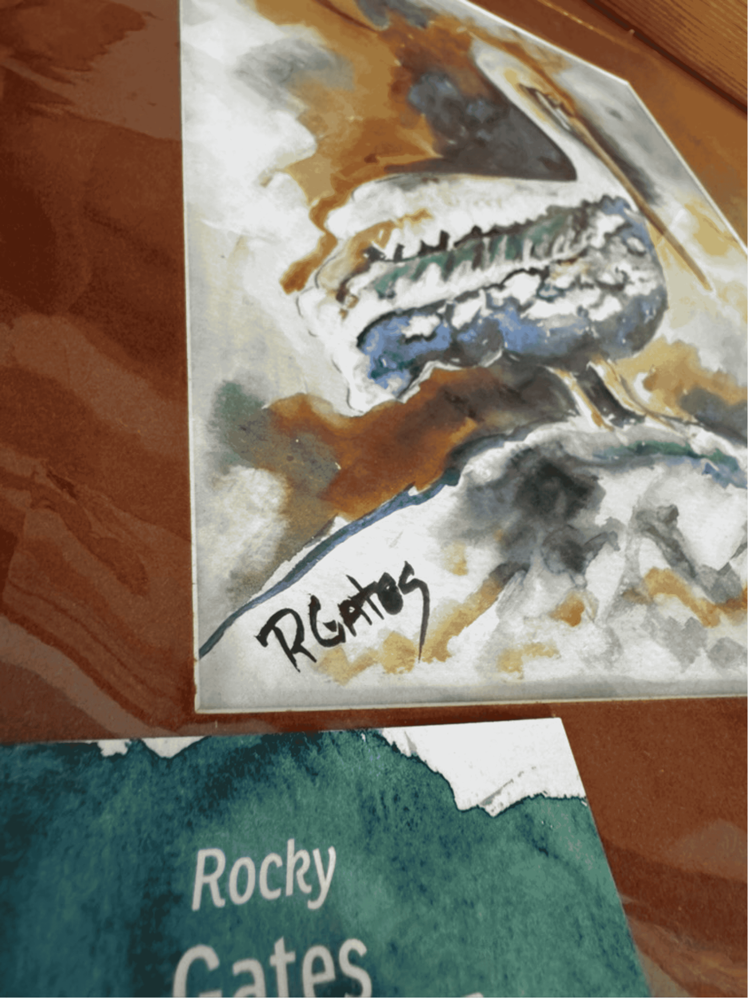 Close-up of artist signature on original pelican watercolor painting by R. Gates.