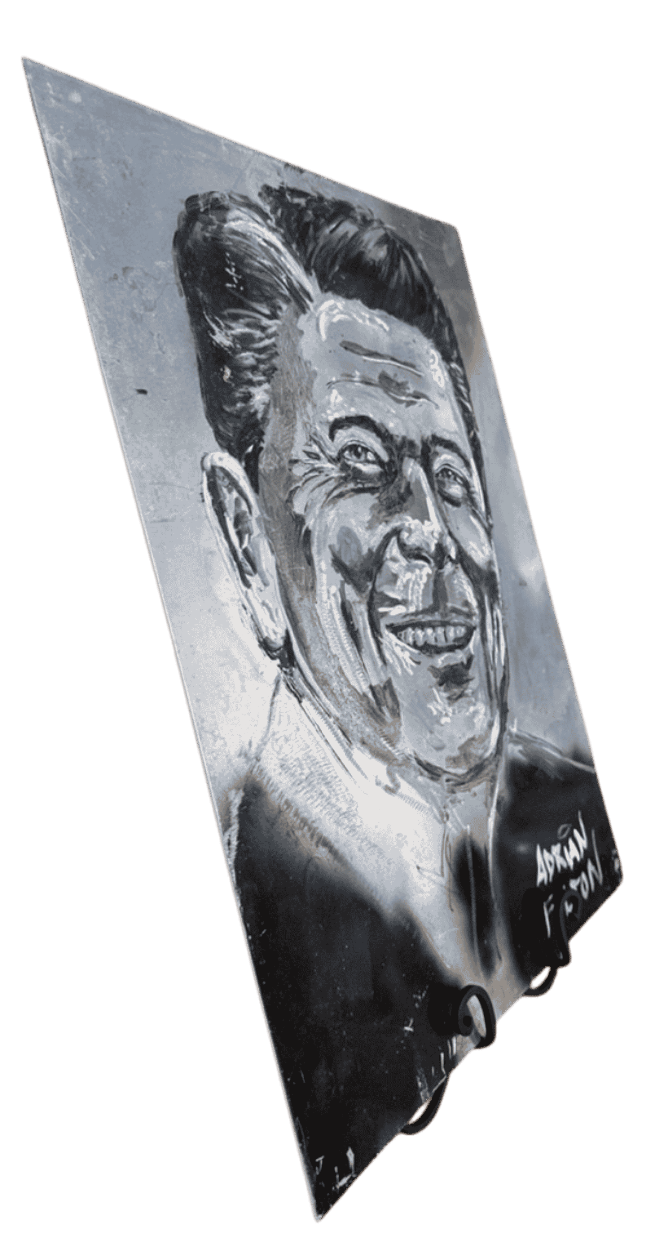 Angled side view of Adrian Fulton aluminum engraving portrait of Ronald Reagan showing reflective metal surface.