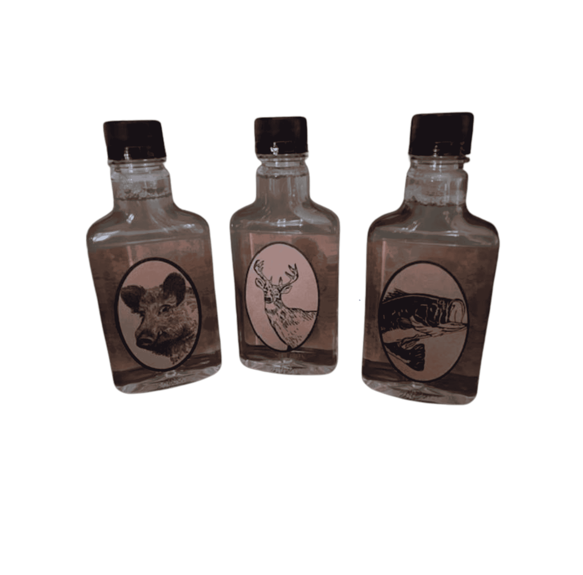 moonshine hot sauce flask trio with deer, fish, and wild boar wildlife labels