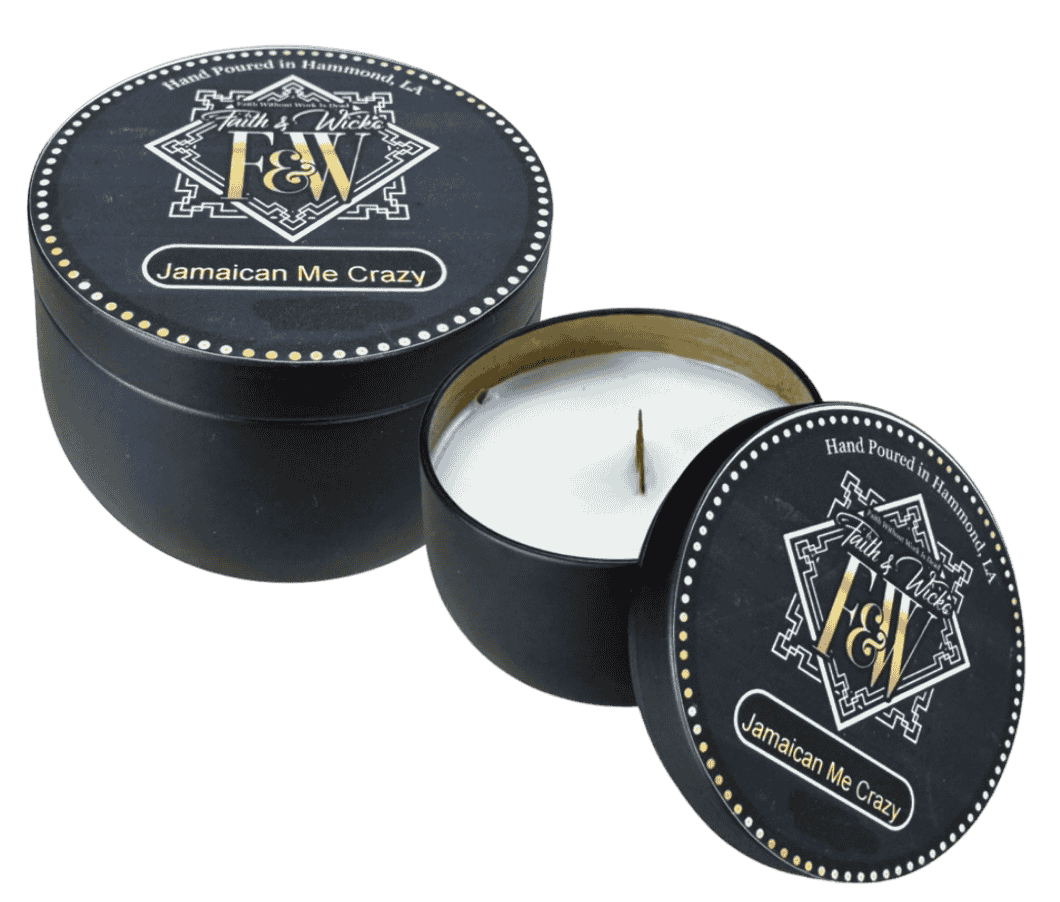 Faith & Wicks Jamaican Me Crazy scented tin candle with black tin, gold label, and single wick candle shown open with lid beside