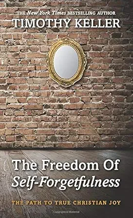 Book cover of 'The Freedom of Self-Forgetfulness' by Timothy Keller, featuring a brick wall and an oval mirror.