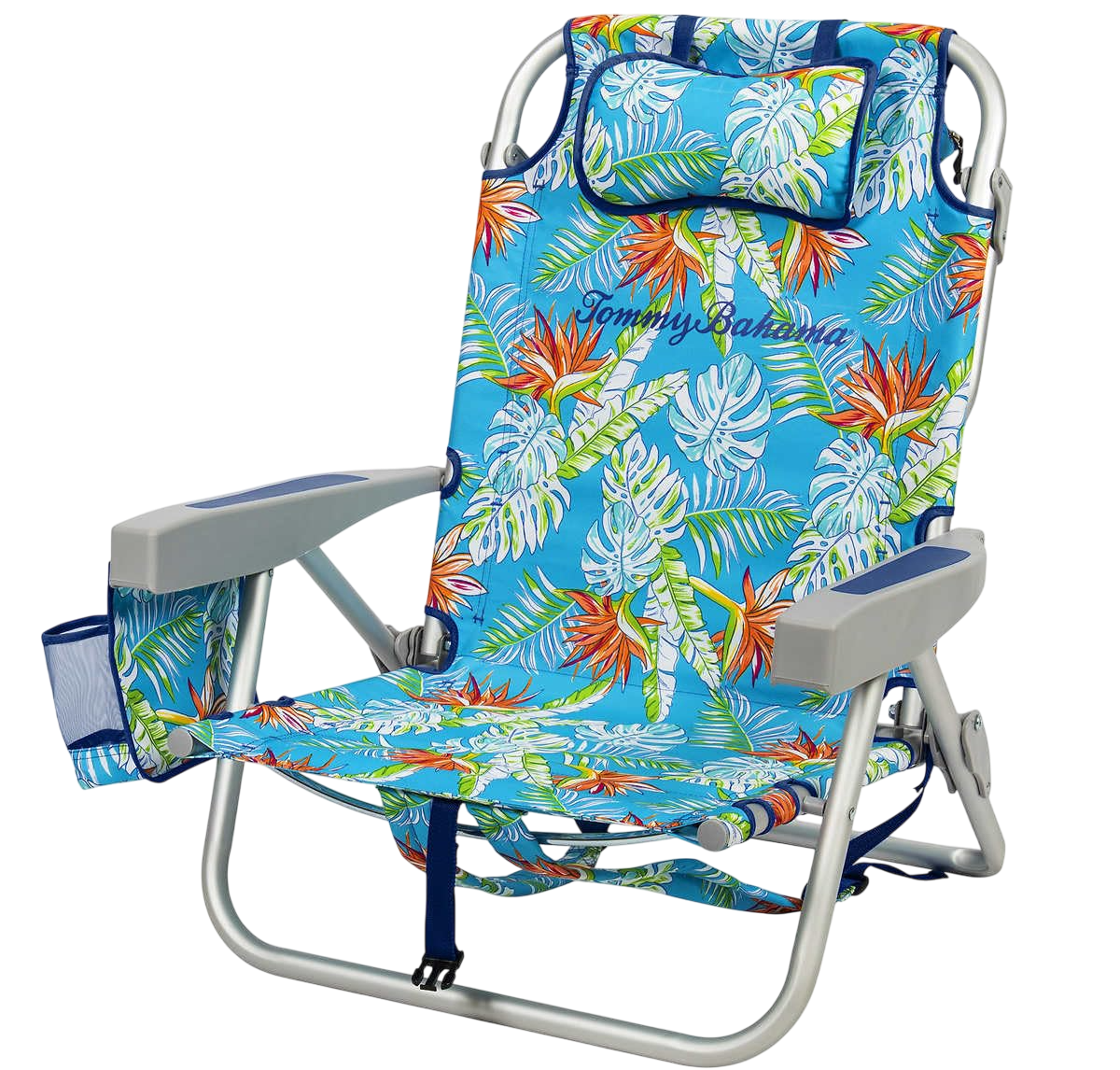 A beach chair with tropical leaf and flower print fabric, featuring the brand name Tommy Bahama embroidered on the backrest.