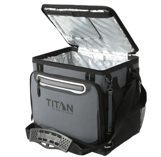 A black and gray Arctic Zone Titan cooler bag with an open insulated interior and a front zippered pocket.