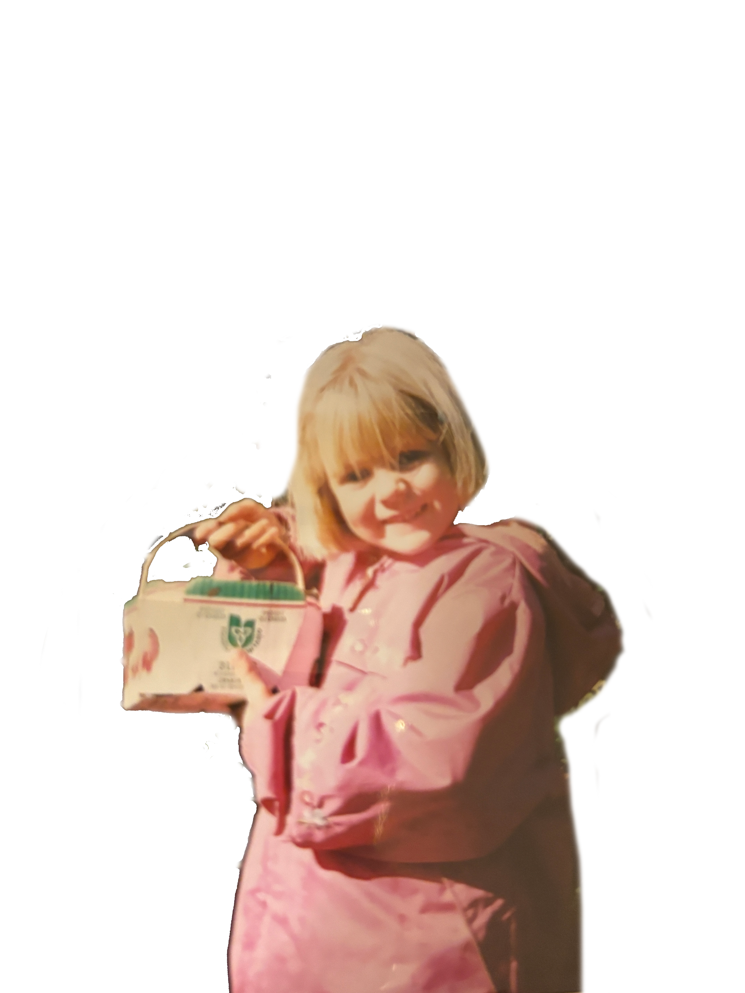 A young girl with blonde hair in a pink jacket holding a white container.