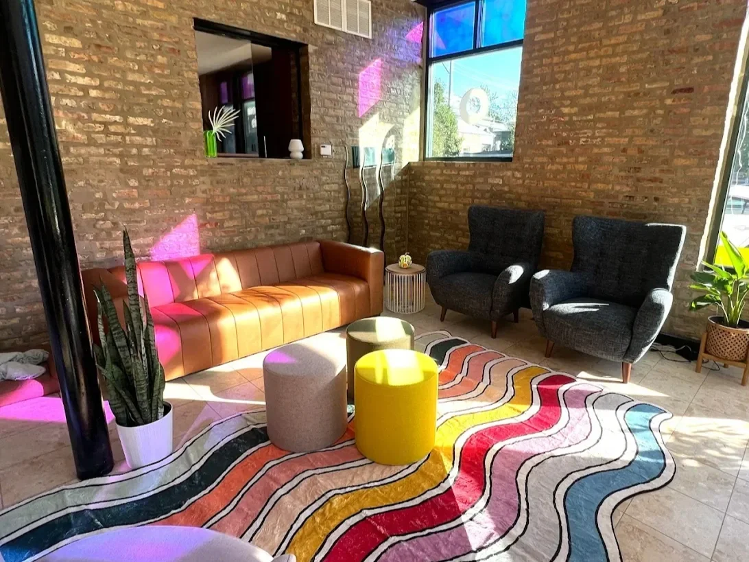 Magic Eight Co. interior studio space with couch, chairs, and seating