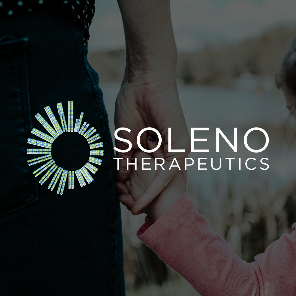 Close-up of a person holding hands with a child outdoors, with Soleno Therapeutics logo overlay.