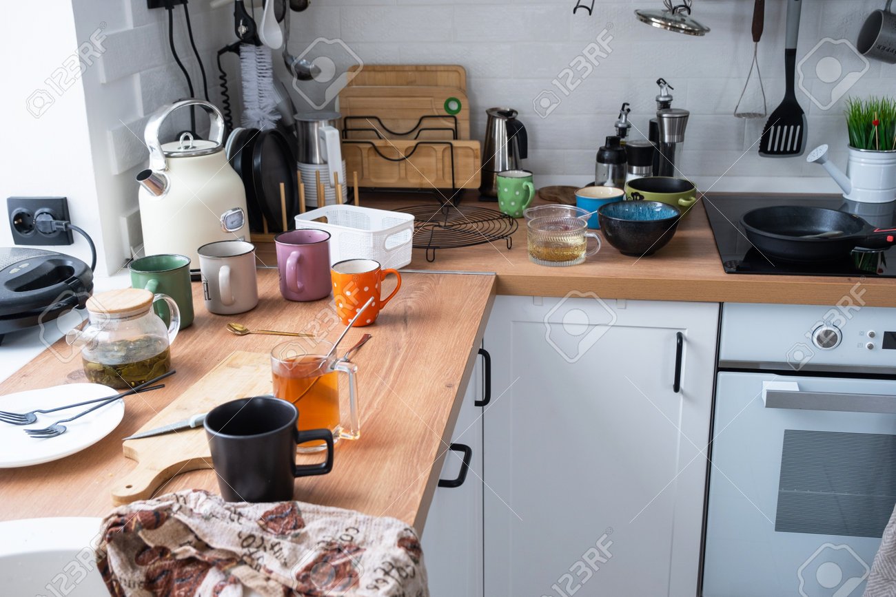 200900974-a-mess-in-the-kitchen-dirty-dishes-on-the-table-scattered-things-unsanitary-conditions-the.jpg