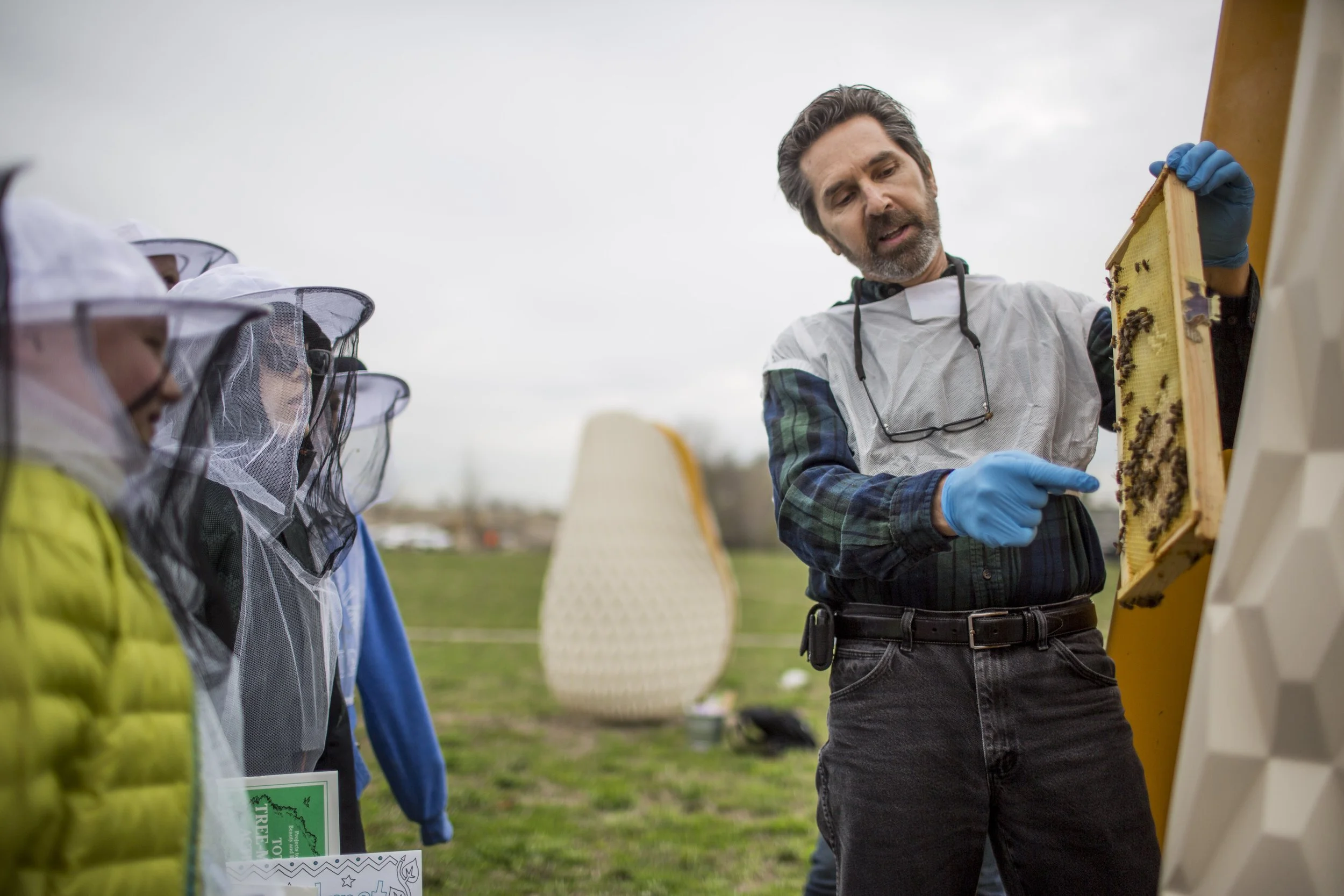  A collection of images featuring candid, editorial and documentary photography showcasing the philanthropic work being done by Ford Motor Co. with beekeepers and pollinators in Dearborn and Detroit, Michigan 