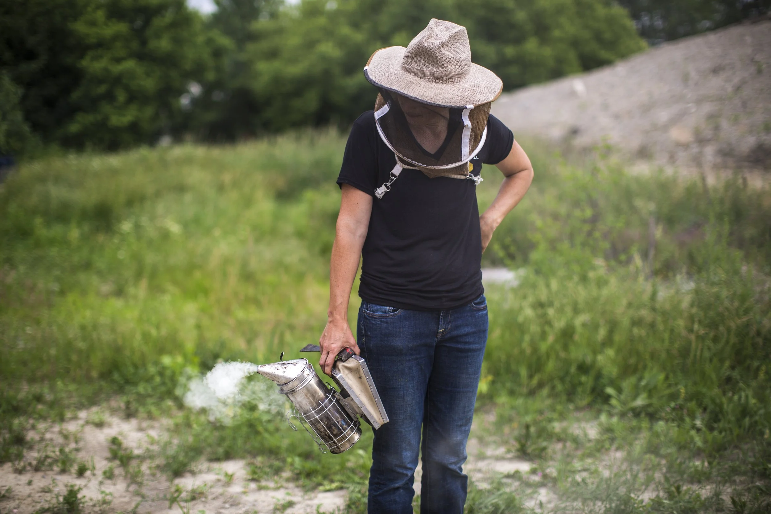  A collection of images featuring candid, editorial and documentary photography showcasing the philanthropic work being done by Ford Motor Co. with beekeepers and pollinators in Dearborn and Detroit, Michigan 