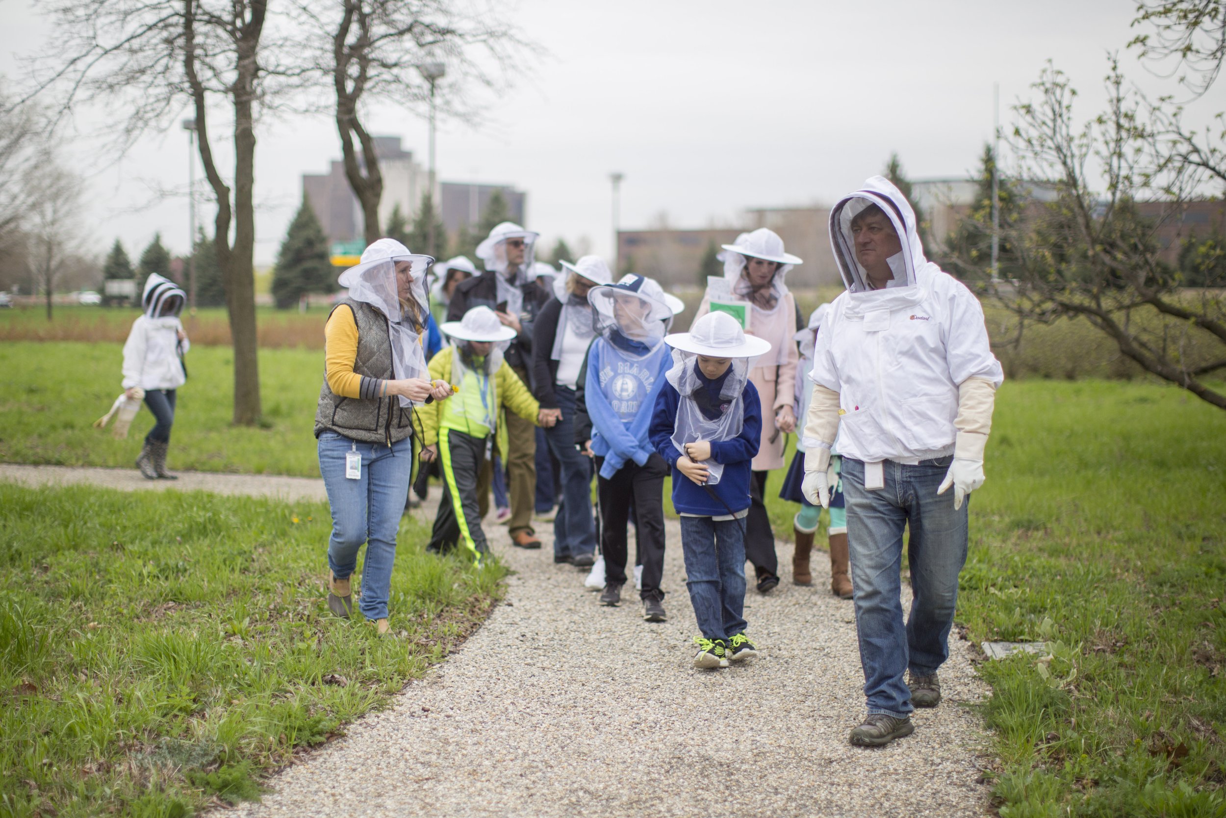  A collection of images featuring candid, editorial and documentary photography showcasing the philanthropic work being done by Ford Motor Co. with beekeepers and pollinators in Dearborn and Detroit, Michigan 