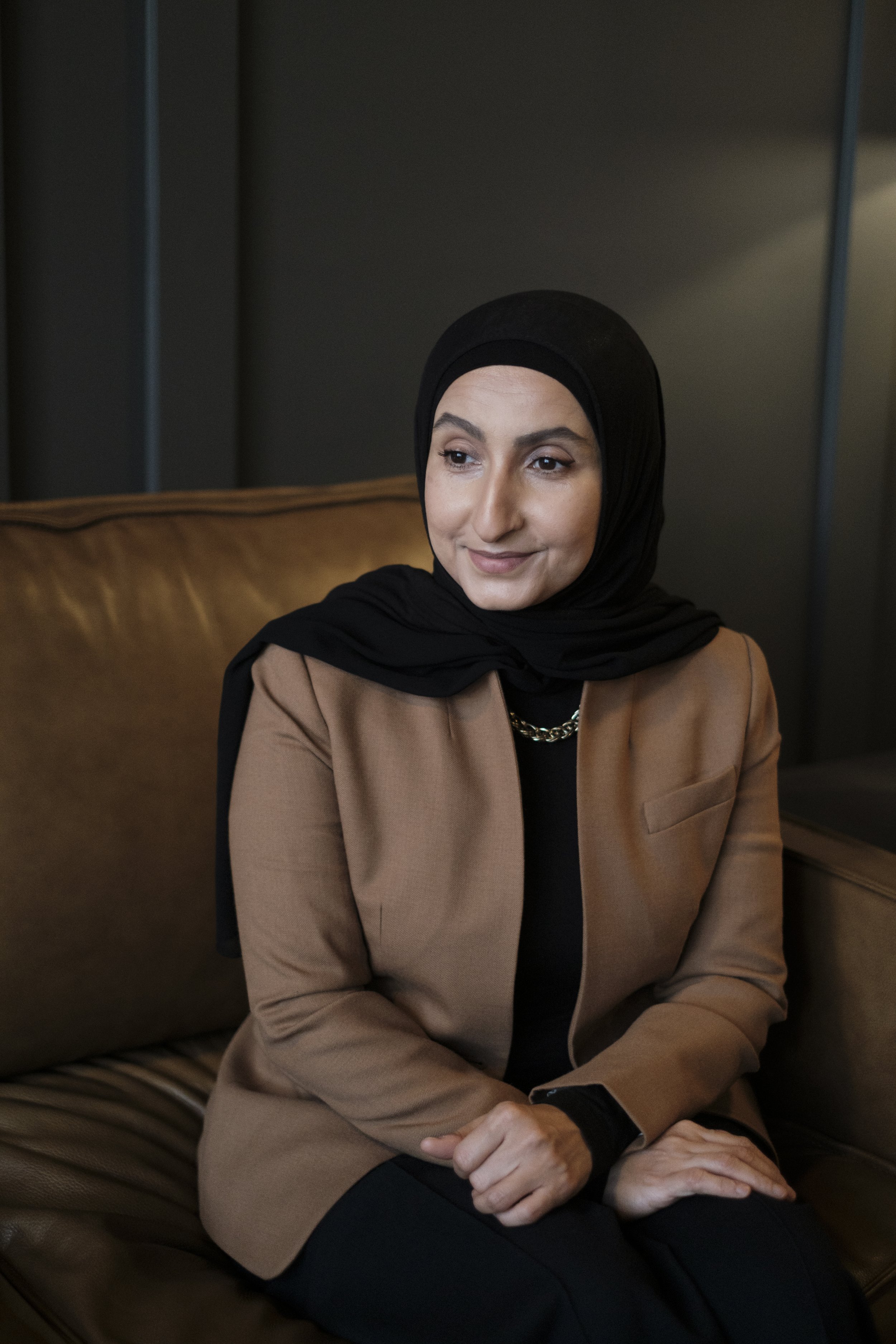  Hanan. An editorial candid portrait of an Author in Dearborn, Michigan    Charlotte Smith is a professional photographer in Ann Arbor, Michigan, offering event photography, portrait photography, and long-form storytelling for brands, organizations, 