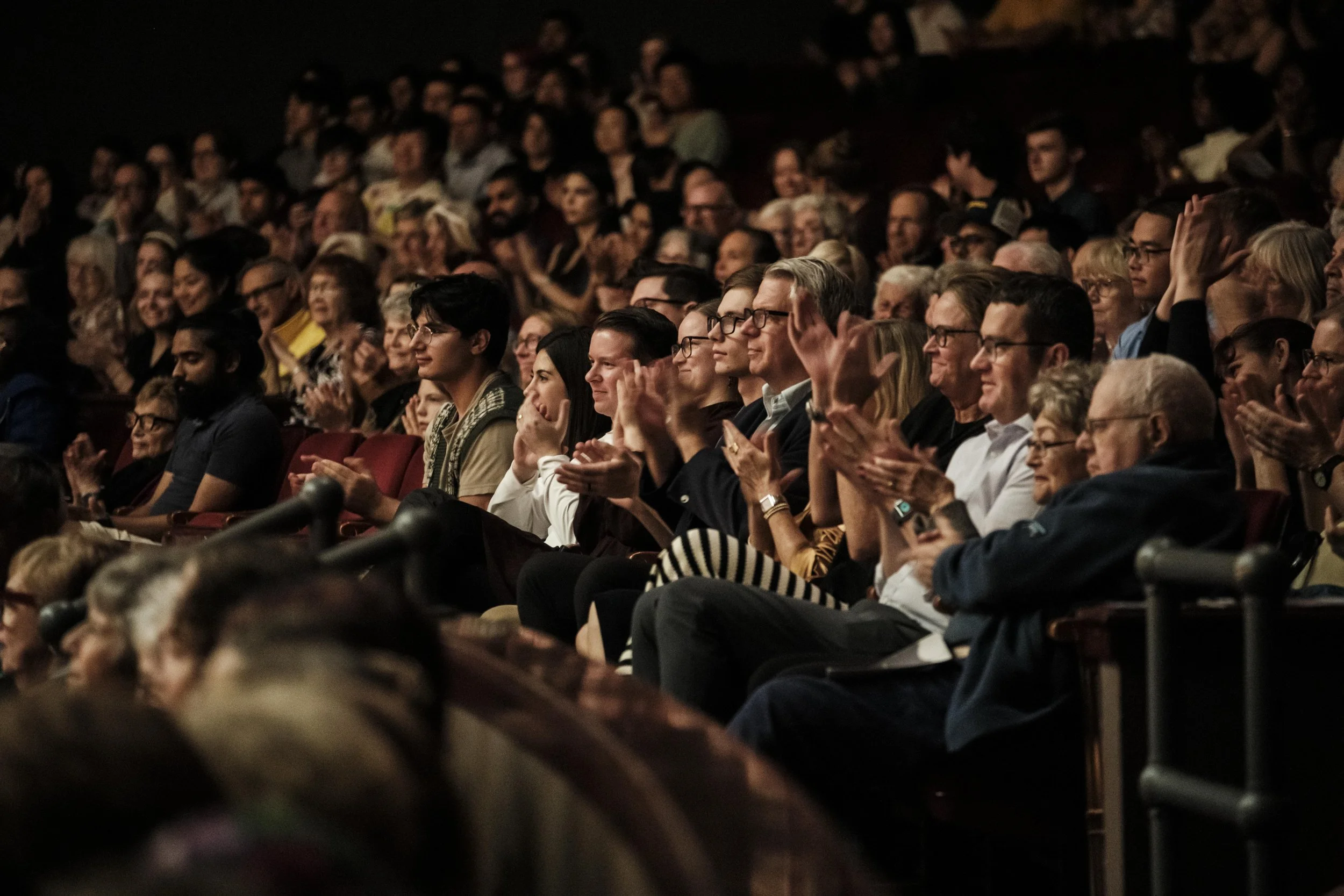 Audience members applaud after a performance by the Ann Arbor Symphony Orchestra