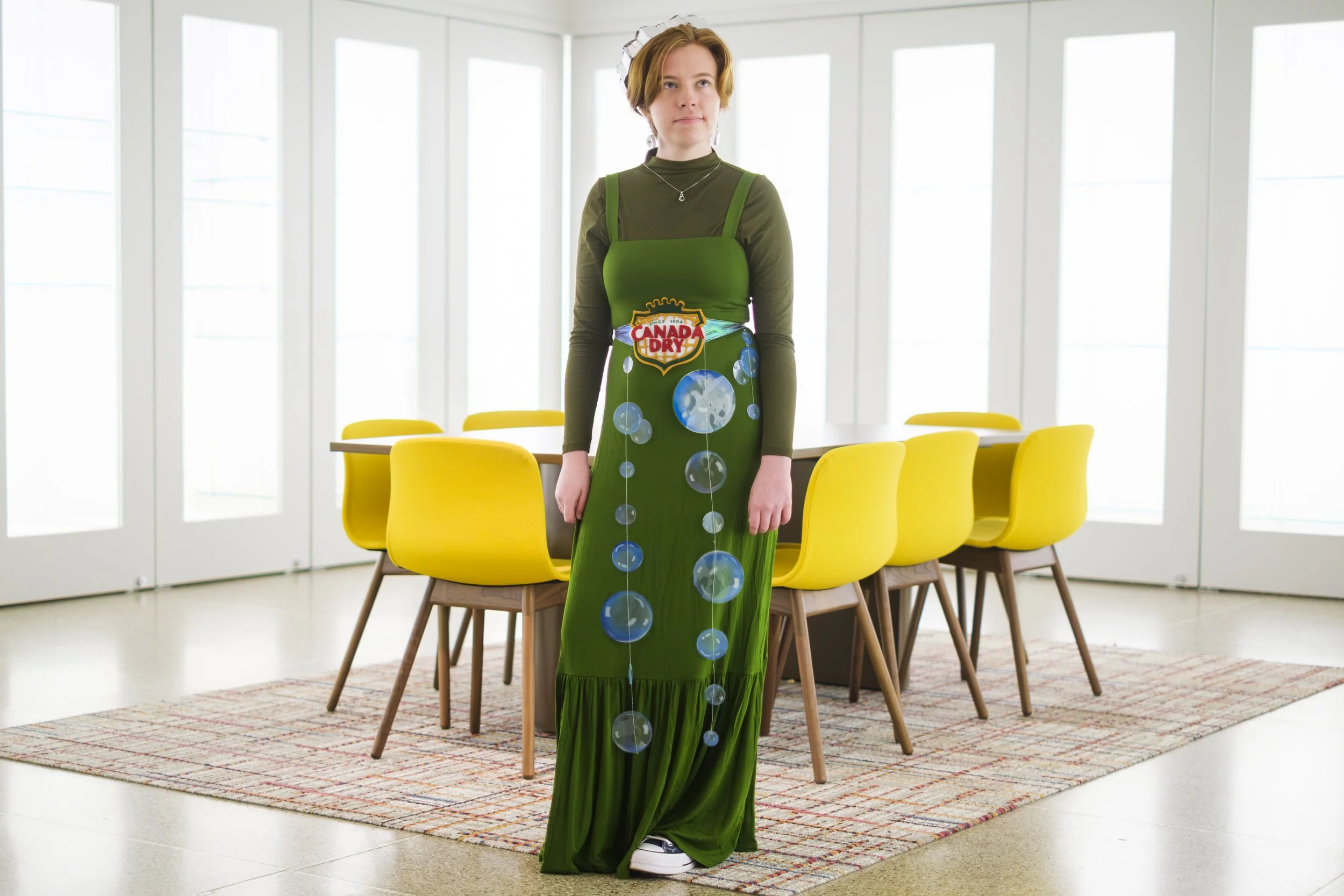 A person dressed in their home made "Canada Dry" Halloween costume poses for a portrait at the University of Michigan Feel Good Friday Halloween Celebration in Ann Arbor, MI.