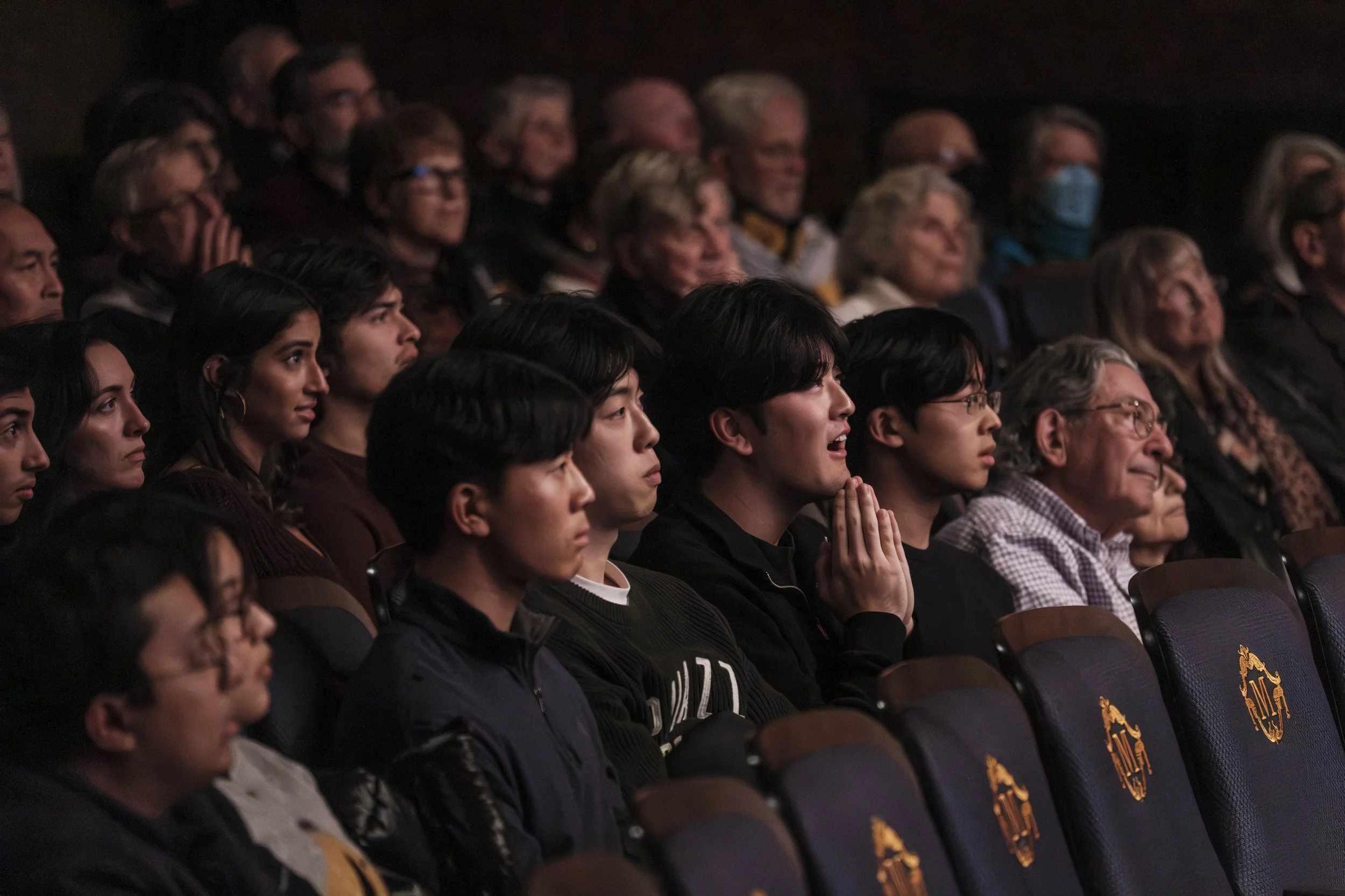 Audience members reacting to a violin solo played by Clara-Jumi Kang during at A2SO concert.