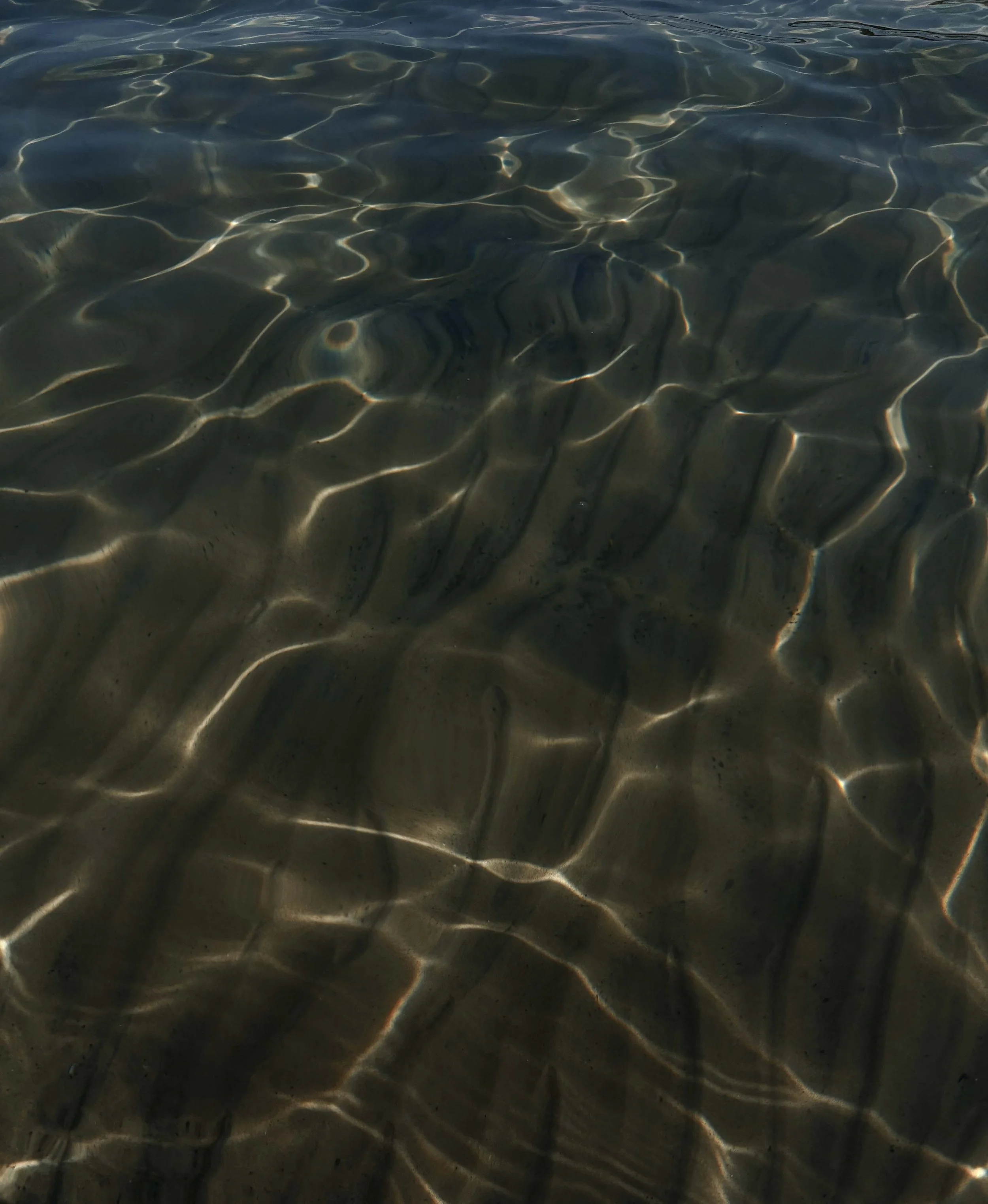 Sunlight reflecting on the sandy bottom of Lake Superior