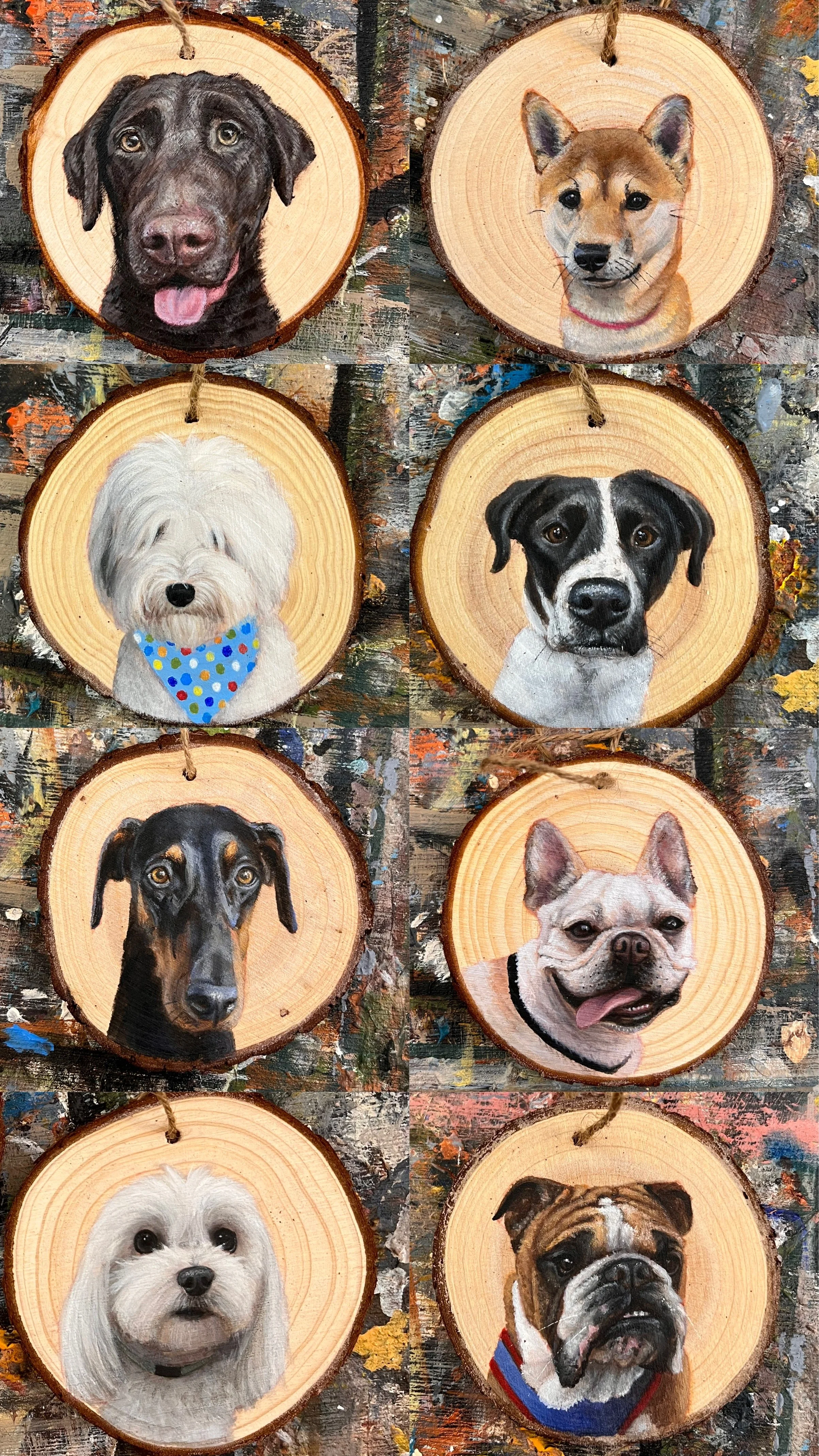 Painted wood slices featuring portraits of eight different dogs arranged in a 2x4 grid.