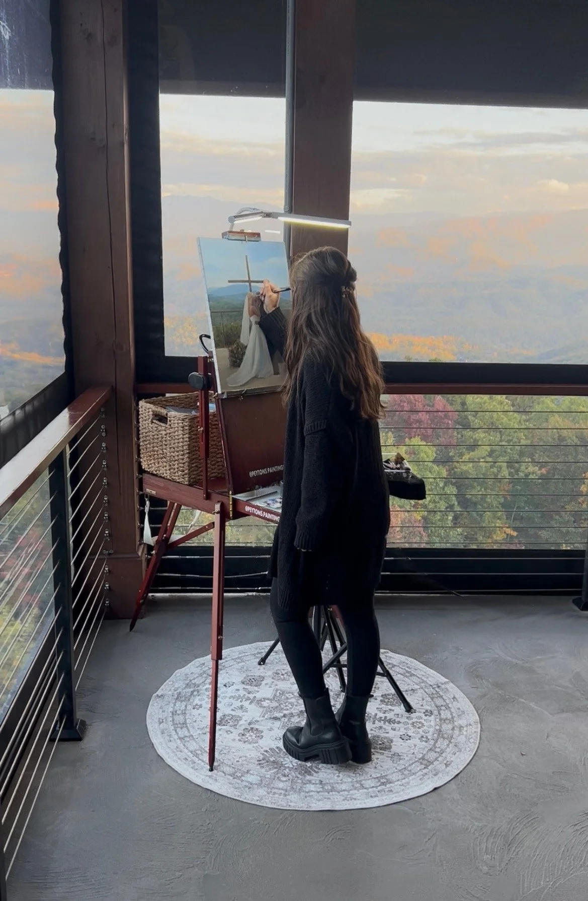 A live wedding painter painting live at a wedding at the Trillium Venue in Sevierville, Tennessee