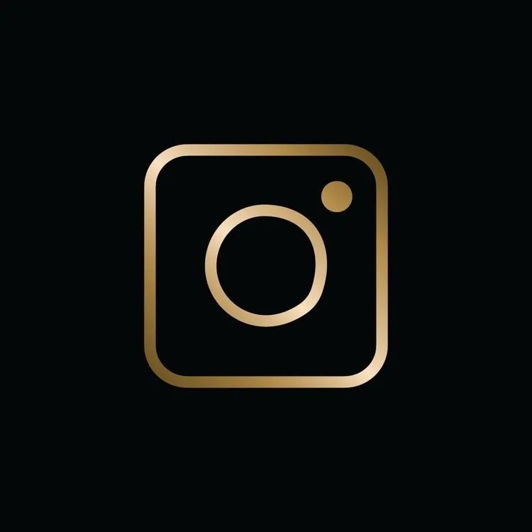 Gold outlined Instagram logo on a black background.