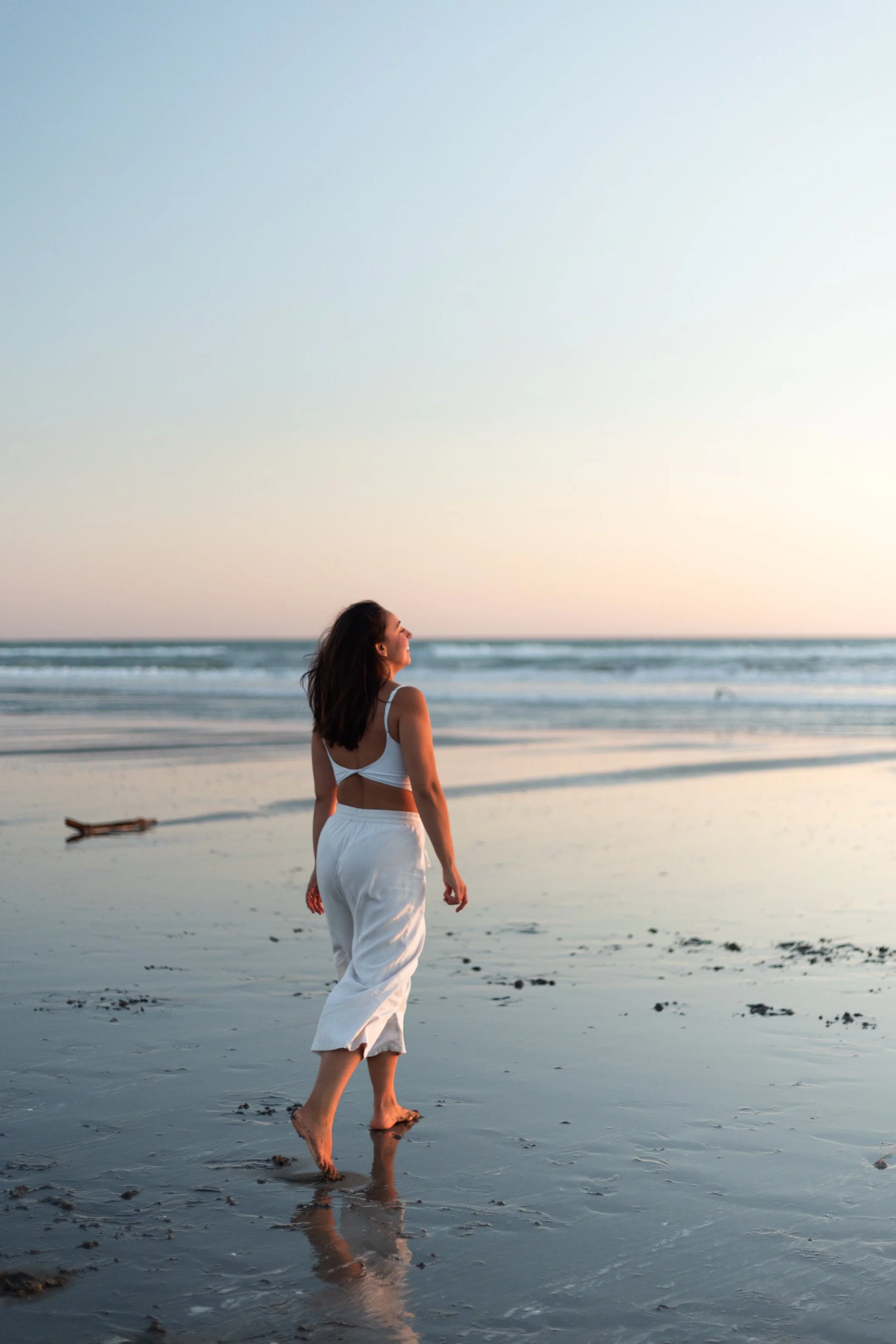 Luana at Waimairi Beach Christchurch, founder of New Moon Wellness