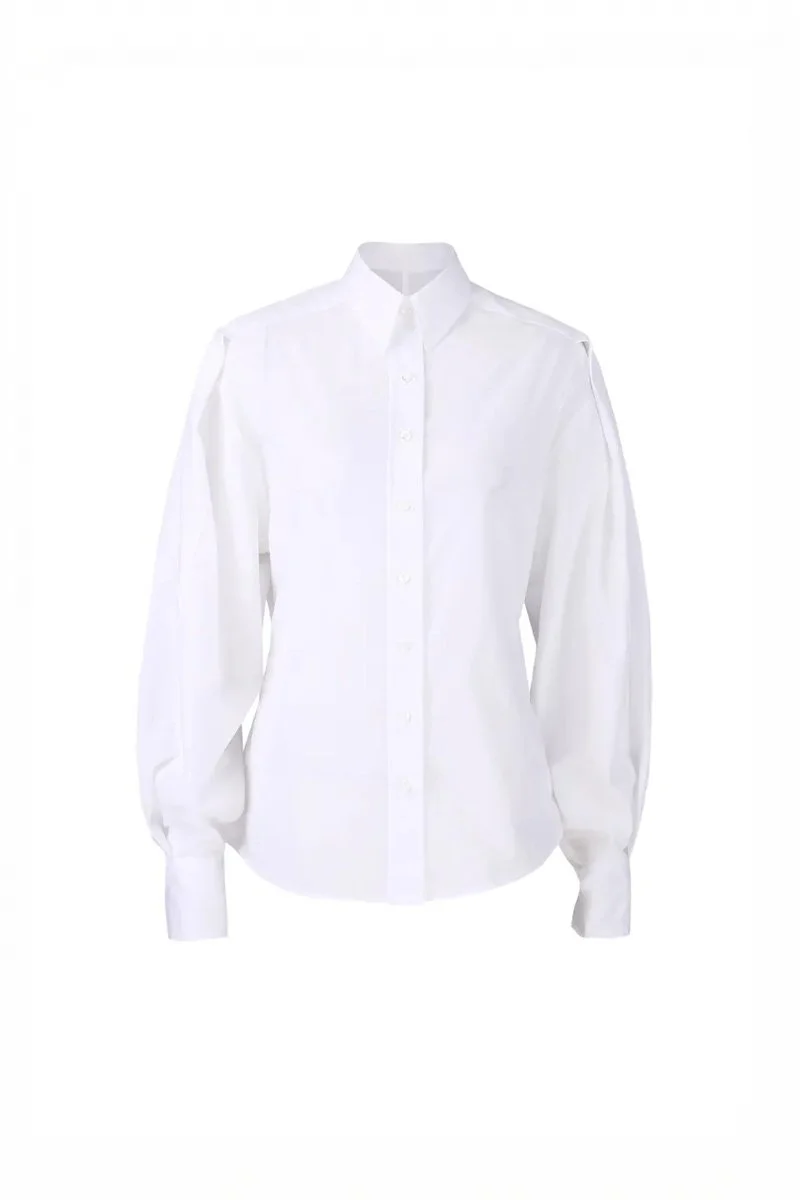 White button-up shirt with long sleeves and a collar.