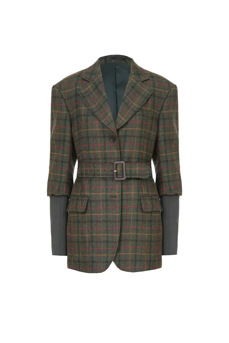 A women's blazer and shorts outfit with a plaid pattern, including a belted blazer with long sleeves and patch pockets, paired with matching plaid shorts.