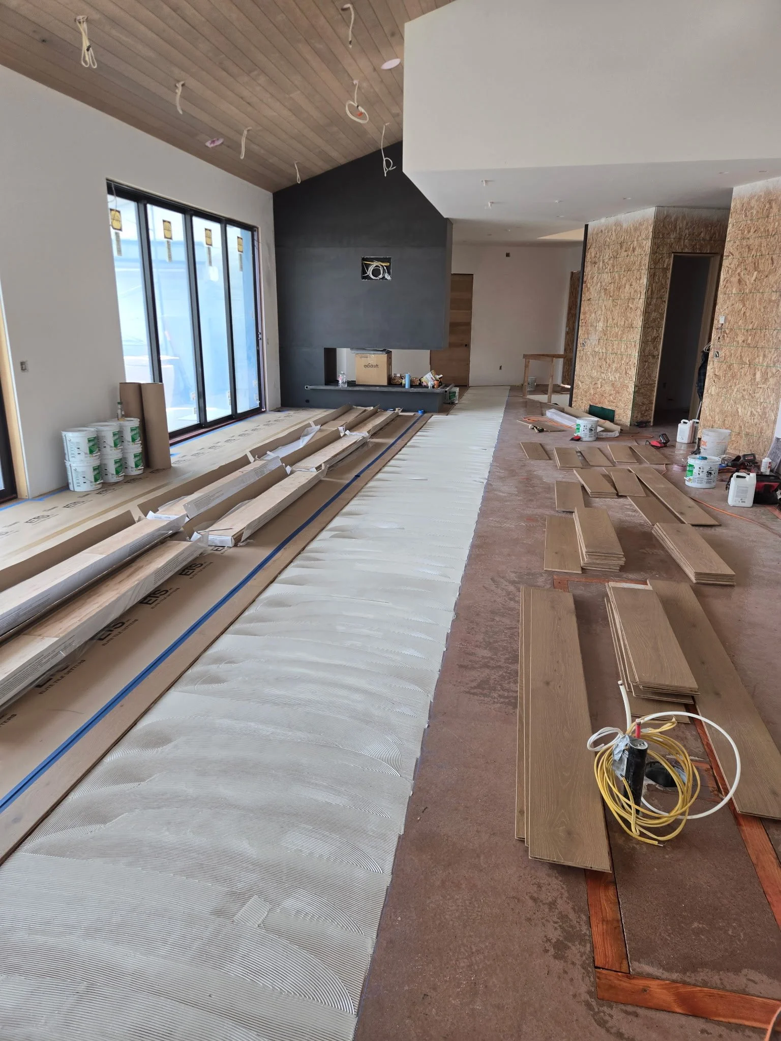 9" European oak engineered pre-finished glue down installation  