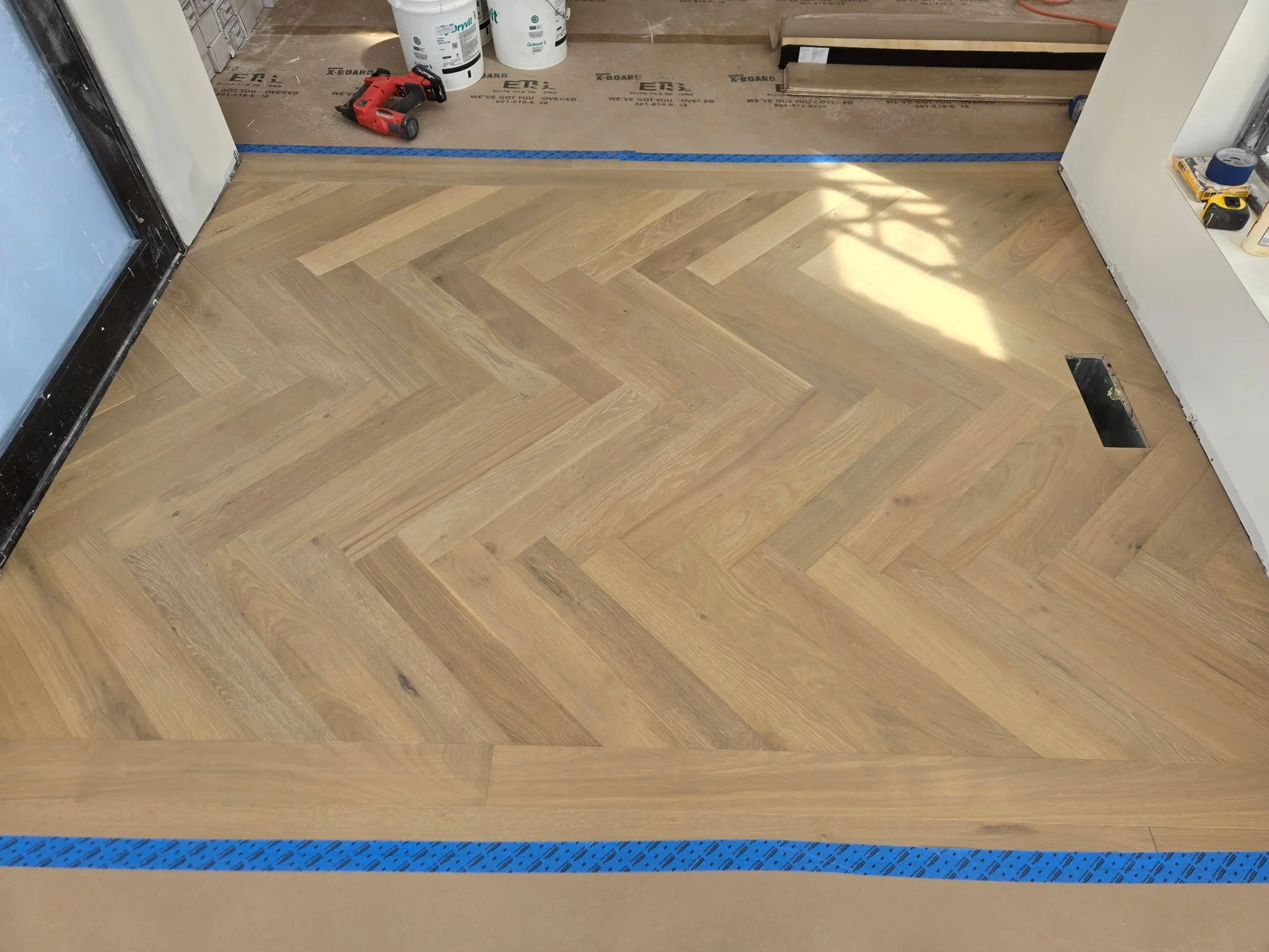 Engineered pre-finished herringbone entry way