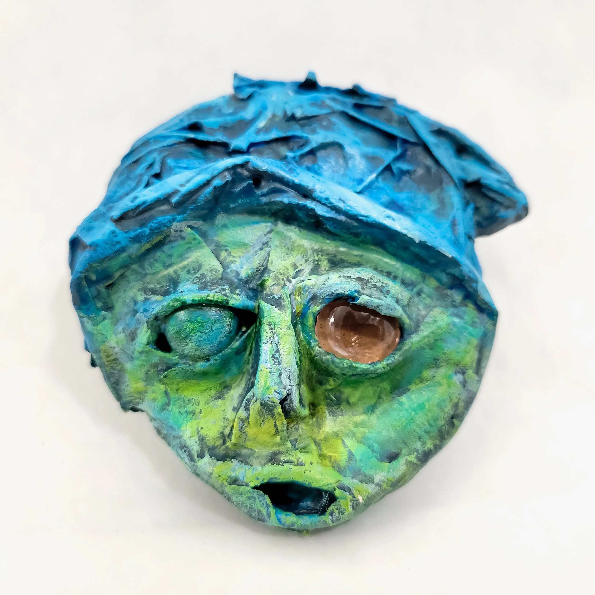 0311 - the artist (front)
– face study segment composed of worktable leftovers