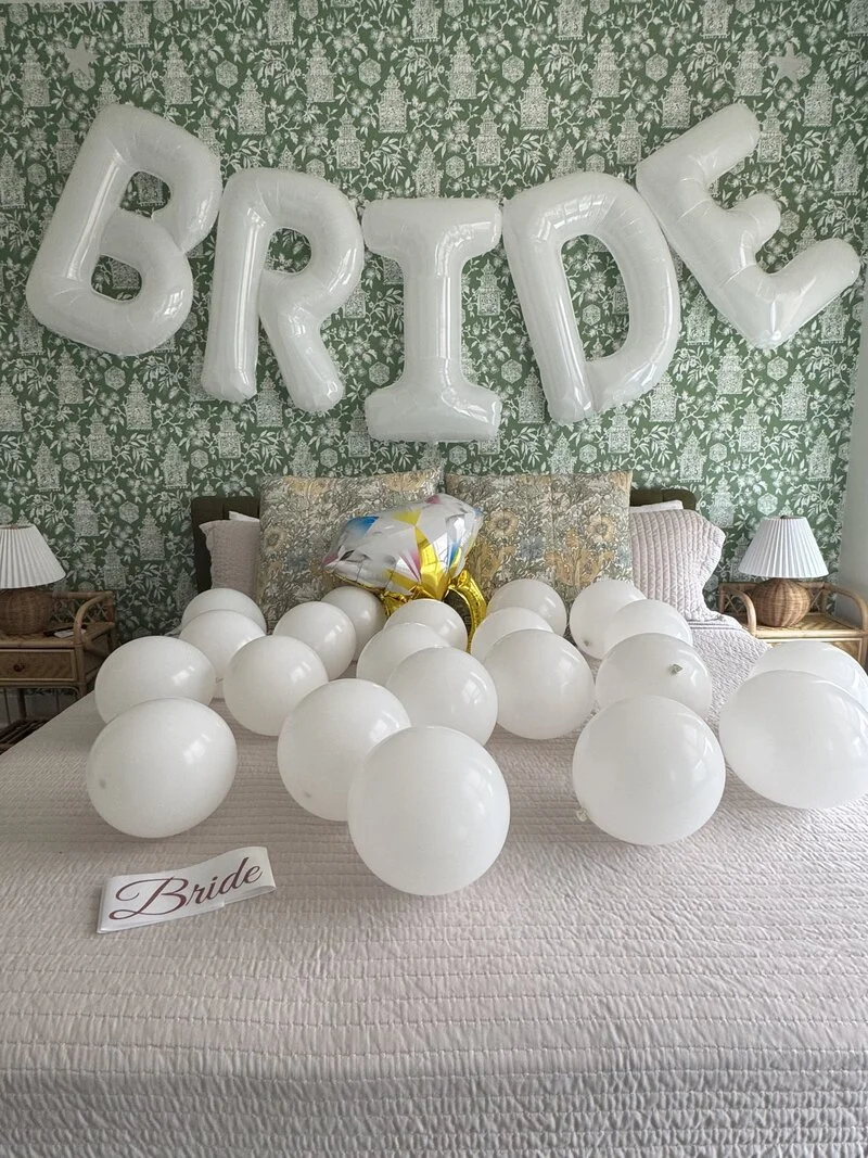 Bride balloons on bed