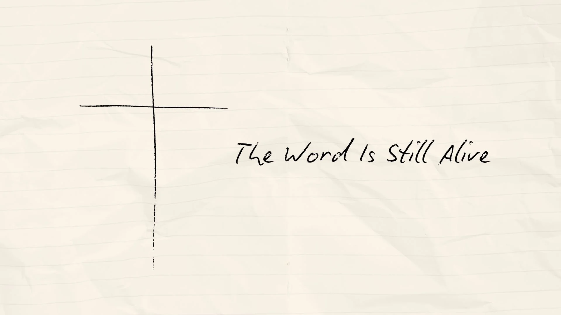 A crumpled piece of lined paper with a simple hand-drawn graph and the handwritten phrase "The Word Is Still Alive."