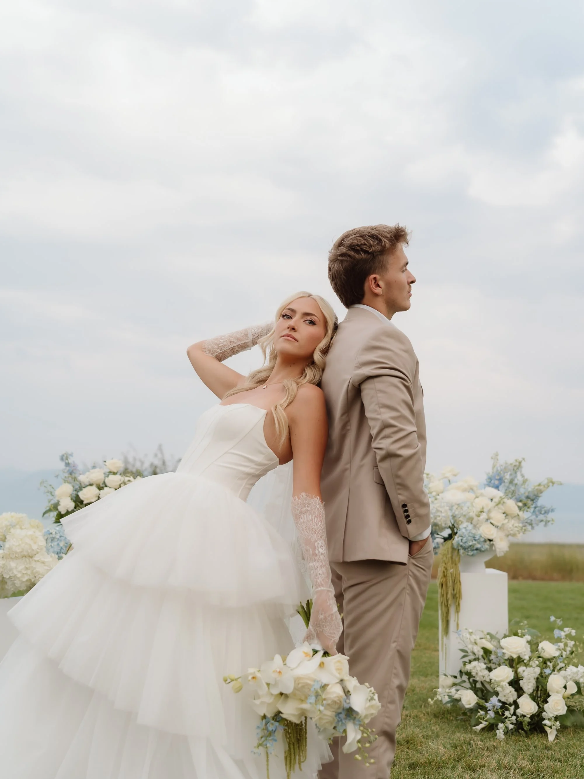 Savy and Conner 🕊️ 🌊 

Creative co-hosts @madisonprincephoto @miramourevents 
Photographers: @madisonprincephoto @dearvyankaweddings 
Dress: @rawgoldenrentals 
Florist: @handfloral.co 
HMUA: @ap.muah 
Venue: @sunriseresortandeventcenter 
Models: @s