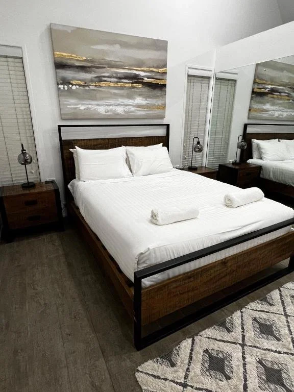 Comfortable, thoughtfully styled bedrooms offer a peaceful rainforest retreat, perfect for travellers seeking relaxed Tamborine Mountain accommodation.